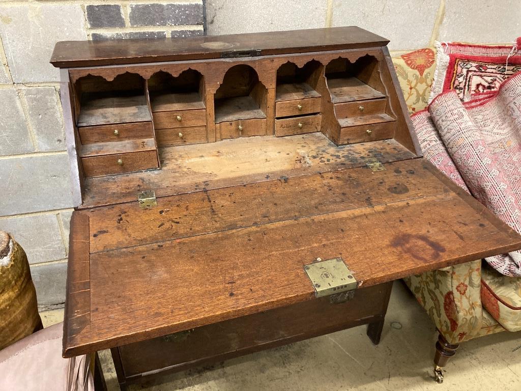 A George III oak bureau, width 94cm, depth 49cm, height 105cm